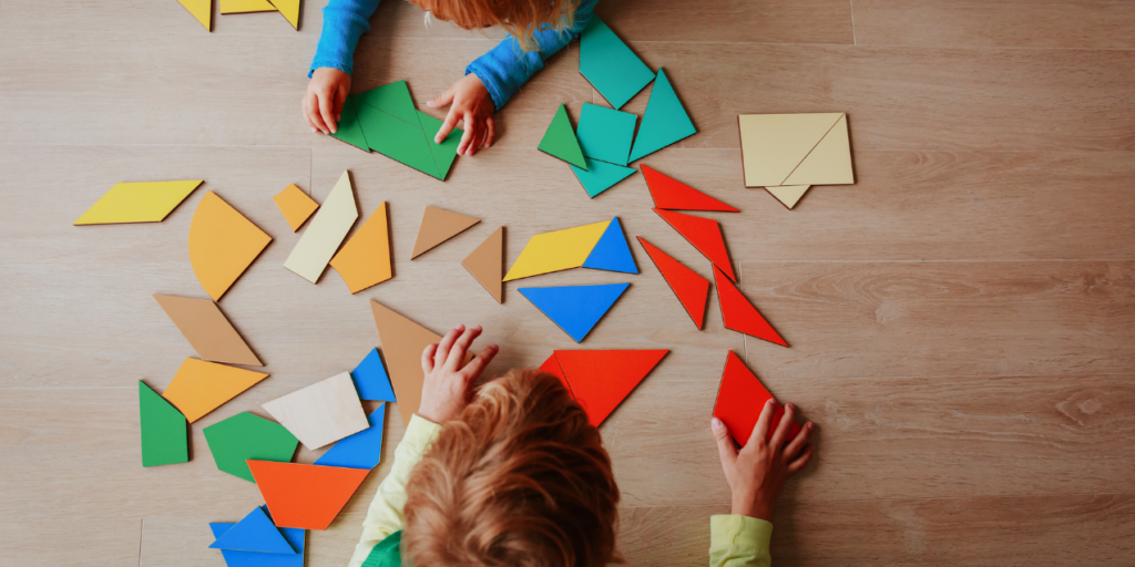 visual discrimination with kids playing attribute blocks puzzle