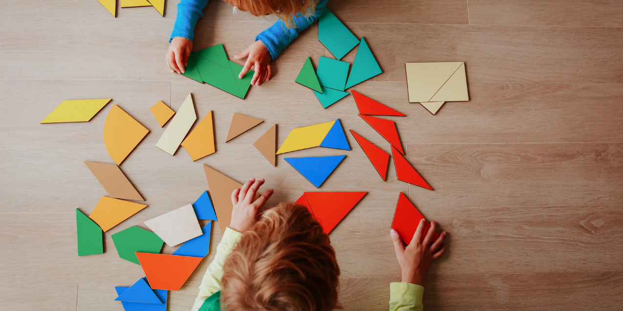 visual discrimination with kids playing attribute blocks puzzle