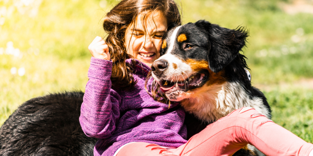 girl with dog showing social emotional skills